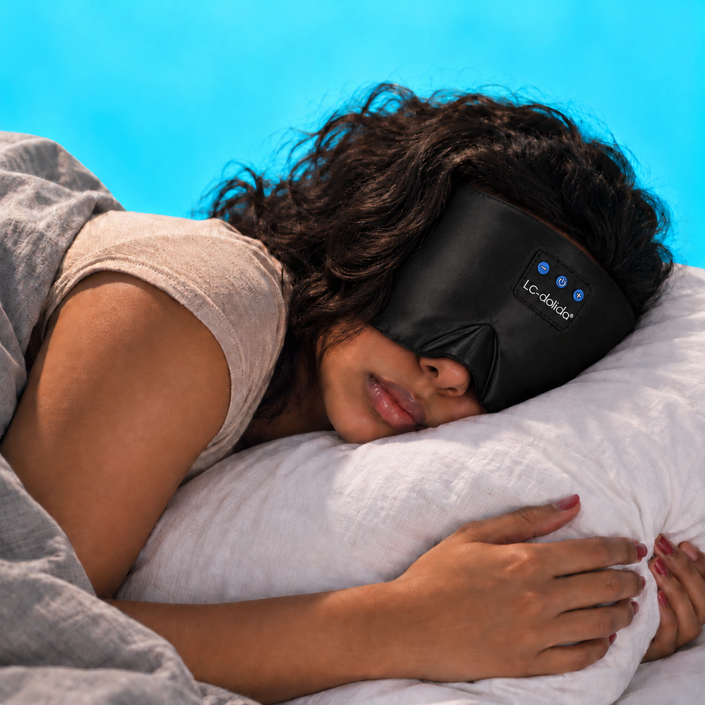 Woman lying on her side wearing a black silk Bluetooth sleep mask