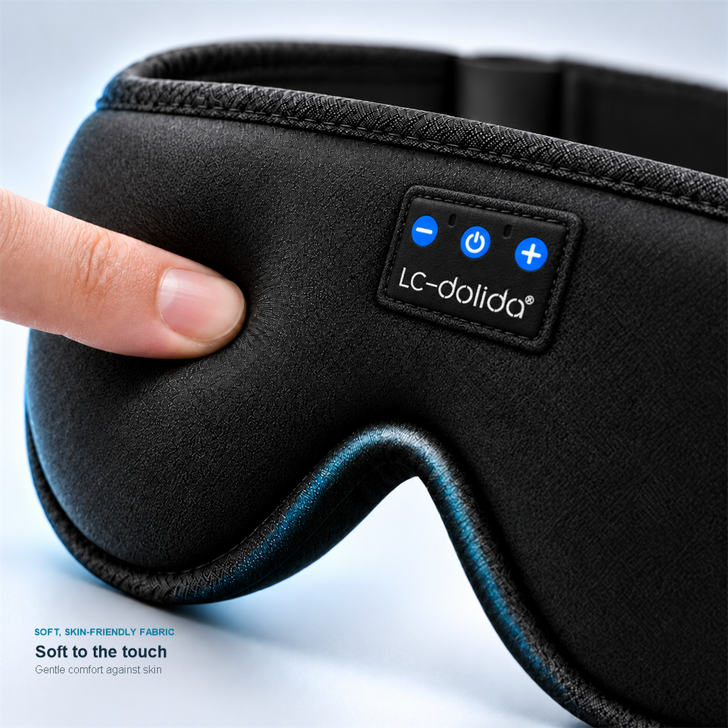 Close-up of the black sleep mask fabric and power and volume controls