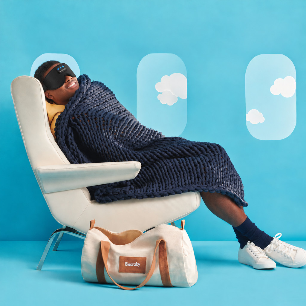 Traveler resting in a seat wearing a black LC-dolida sleep mask